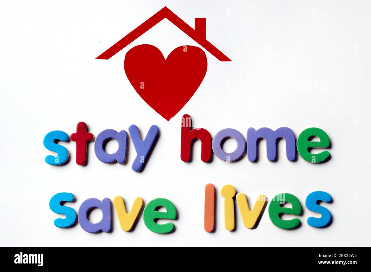 `Stay home, save lives` slogan due to Coronavirus pandemic outbreak around the world. Coronavirus Covid-19, quarantine motivational phrase. Stock Photo